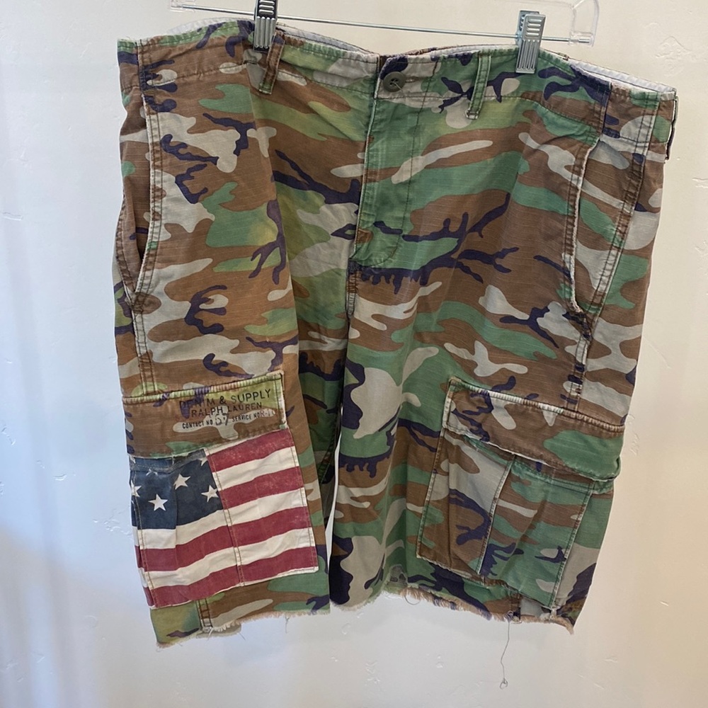Ralph Lauren camo shorts, size 38 with the American flag on the side pocket.